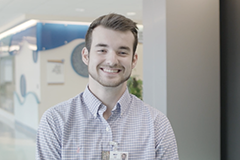 Male student smiling.