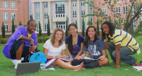 Students sitting on grass